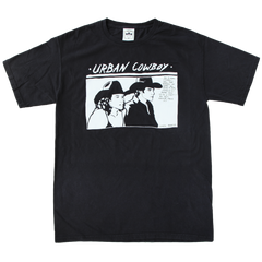 "Urban Cowboy" is a design inspired by the classic film, printed in white ink on a classic black tee by Vinyl Ranch. "You a real cowboy?"